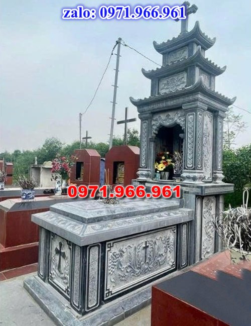 mẫu mộ công giáo nguyên khối sang trọng bằng đá xanh rêu cao cấp, mộ công giáo chuẩn phong cách thiên chúa giáo cho ông bà, cha mẹ đẹp bền vững theo thời gian, mẫu mộ công giáo bằng đá chất lượng cao, giá rẻ phù hợp cho gia đình, mẫu mộ công giáo được điêu khắc chạm chổ hoa văn tinh xảo theo yêu cầu khách hàng